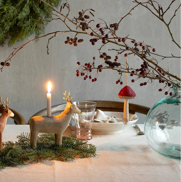 maileg - red mushroom fabric ornament hanging on branch in festive table scene - winter's moon