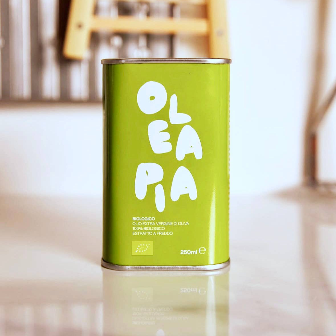olea pia - tin of extra virgin olive oil on countertop - winter's moon