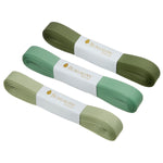 bungalow denmark - trio of green ribbons on white background - winter's moon